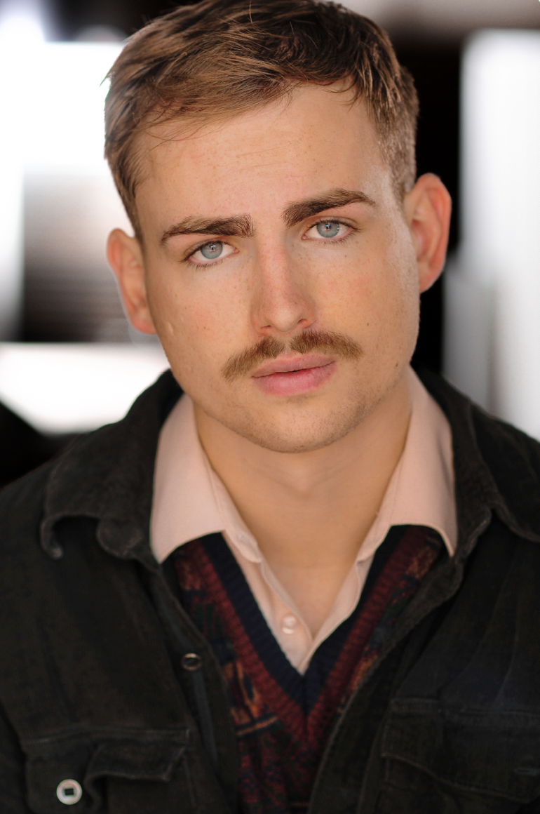 Will Warner with a mustache